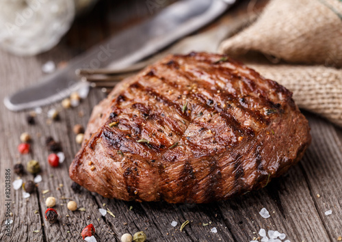 Beef steak on a wooden board Canvas Print