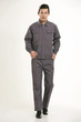 © quweichang - The young engineer various occupation clothing standing in front