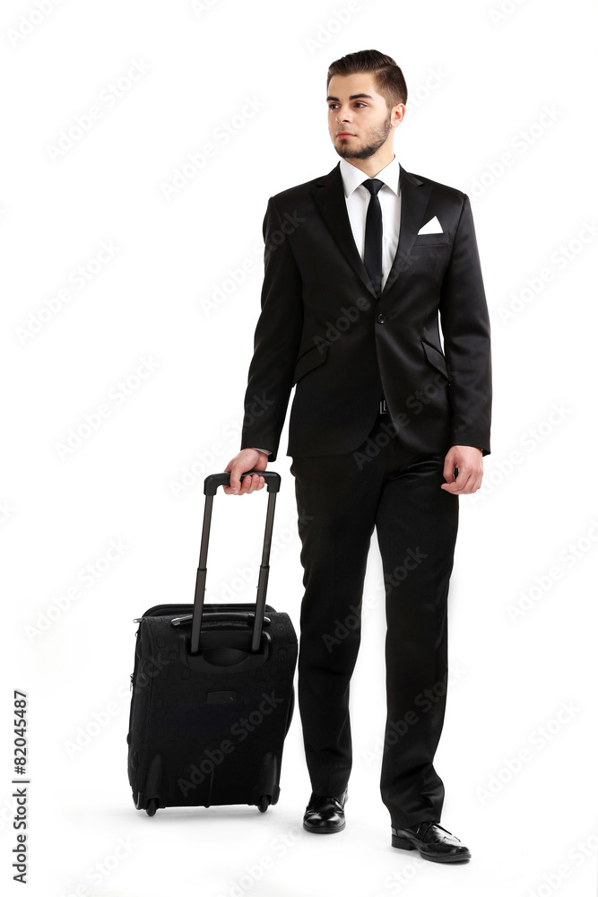 Elegant man in suit with suitcase isolated on white