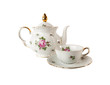Porcelain teapot, teacup and saucer with rose