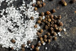  salt crystals and black peppercorns