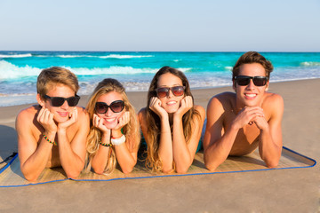 Beach friends together tourits portrait on the sand