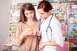 © DC Studio - Woman doctor and client inside pharmacy