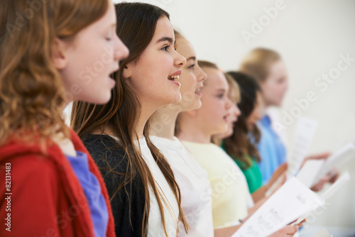 Fotografía Group Of School Children Singing In Choir Together