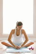 © Patrick Lane/Blend Images - Pregnant woman practicing yoga