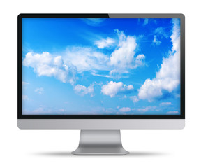 Sticker - Computer display with blue sky and beautiful clouds on screen.