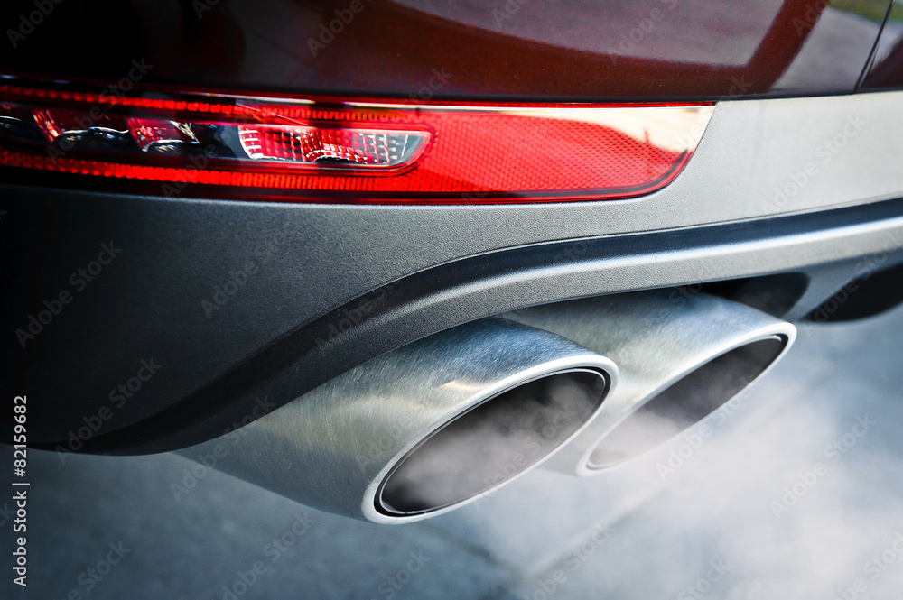Close up of a car dual exhaust pipe - obrazy, fototapety, plakaty 