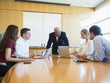 © Erik Isakson/Blend Images - Business people talking in meeting