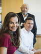 © Erik Isakson/Blend Images - Business people smiling in meeting