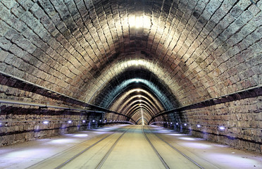 Wall Mural - Tunnel with railroad and tram