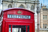 Fototapeta Londyn - Famous red telephone booth in London