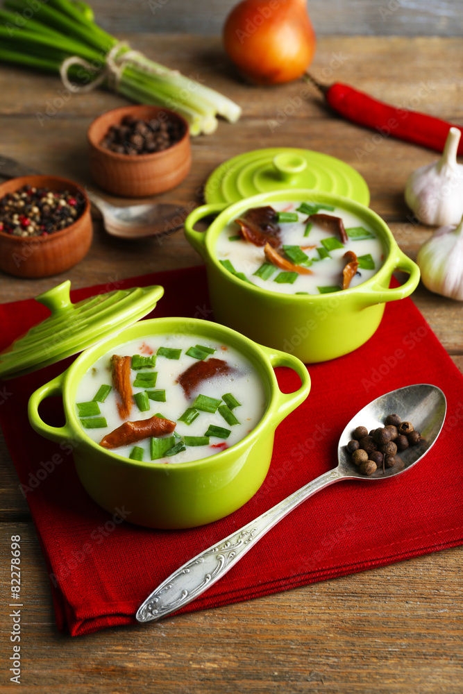 Mushroom soup on wooden background