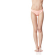 © vladimirfloyd - naked female legs and pink panties on a white background