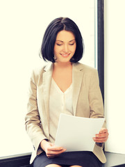 Poster - happy woman with documents