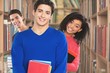 © BillionPhotos.com - Students. Group of university students at the library smiling