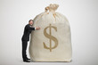 © ArtFamily - happy man embracing big bag with money
