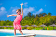 © travnikovstudio - Adorable little girl on boat during summer vacation