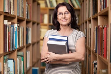 Wall Mural - Women. Holding Books