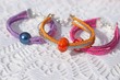 colorful bracelets and other craft items of jewelry