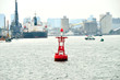 Red channel marker buoy in the harbor