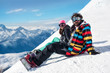© guruXOX - young couple enjoying winter mountains