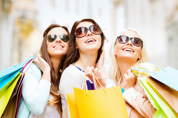 Poster - girls with shopping bags in ctiy