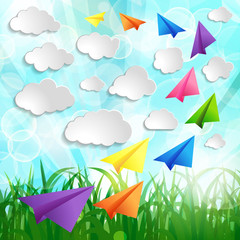 Paper airplanes with clouds on on a Natural green abstract Backg