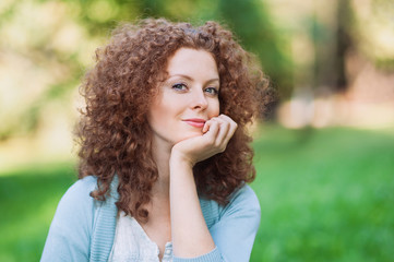 Wall Mural - Beautiful young woman outdoors