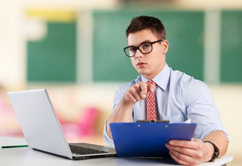 Canvas Print - Laptop. Student working on laptop in library