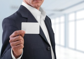 Wall Mural - Business Card. Businessman showing his business card