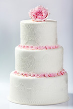 White Wedding Cake With Pink Rose