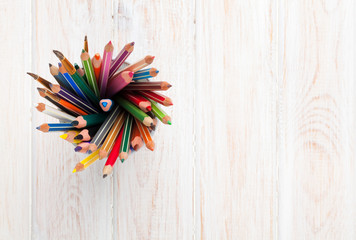 Office desk table with colorful pencils