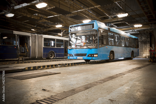 Naklejka ścienna dirty, oily bus garage inspection pit