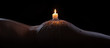 © Alta Oosthuizen - Body scape of a well-shaped woman with burning candle and wax on