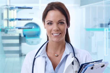 Female doctor in MRI room of hospital