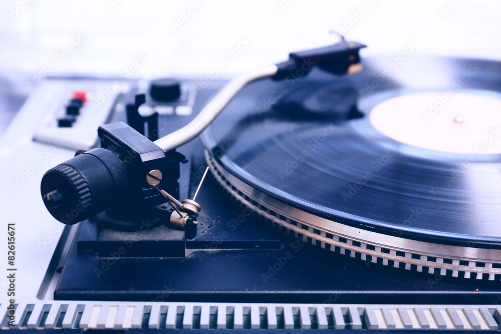 Gramophone with a vinyl record, closeup