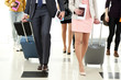 © Africa Studio - People with suitcases in airport