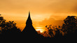 © NewSaetiew - Silhouettes Pagoda sunset orange sky