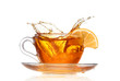 © YURII Seleznov - lemon tea with a splash on a white background
