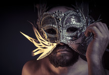 Bearded Man With Silver Mask Venetian Style. Mystery And Renaiss