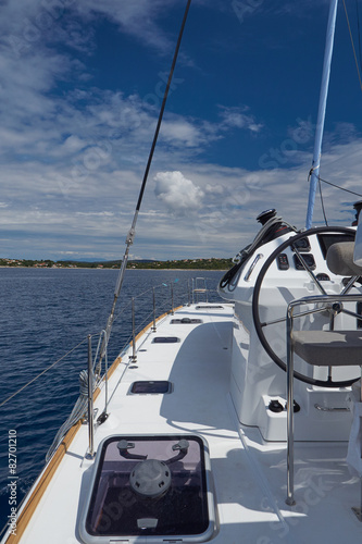 Fototapeta na wymiar sailing boat in calm beautiful blue sea in croatia