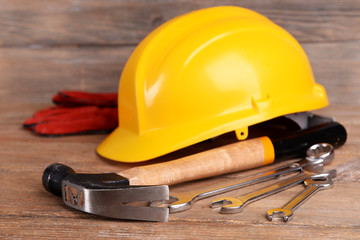 Sticker - Construction tools with helmet on table close up