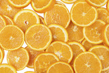 Sliced citrus fruits on a white background