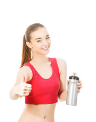 athletic girl drinks water after exercising isolated in white ba