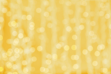 Wall Mural - blurred golden background with bokeh lights