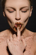 sexy woman with chocolate, finger in your mouth