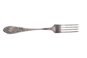 Old metal fork isolated on a white background