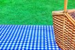 Picnic Basket On The Table With Blue White Tablecloth
