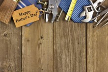 Fathers Day Gift Tag With Top Border Of Tools And Ties On Wood