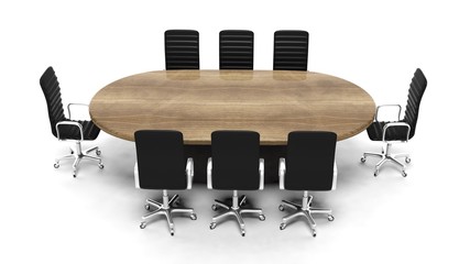 Oval wooden meeting room table with leather chairs